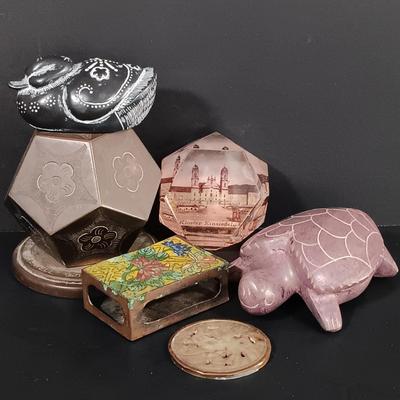 LOT 121: Hand Carved Pearlite Stonecraft Duck, Hexagonal Metal Coin Bank, Carved Stone Game Token & More