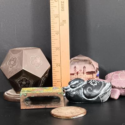 LOT 121: Hand Carved Pearlite Stonecraft Duck, Hexagonal Metal Coin Bank, Carved Stone Game Token & More