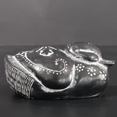 LOT 121: Hand Carved Pearlite Stonecraft Duck, Hexagonal Metal Coin Bank, Carved Stone Game Token & More