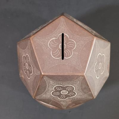 LOT 121: Hand Carved Pearlite Stonecraft Duck, Hexagonal Metal Coin Bank, Carved Stone Game Token & More