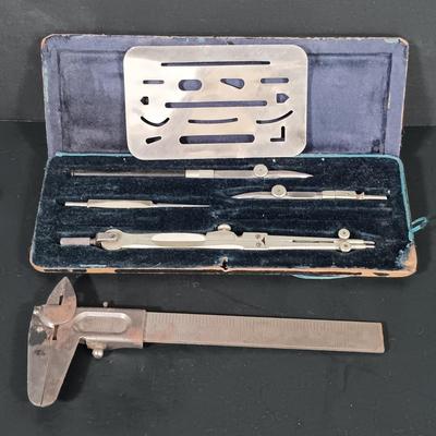 LOT 122: Miniature Copper Pitchers, Handblown Glass Animal, Copper Print Plates, Drafting Tools & More