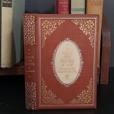 LOT 124: Antique Extendable Book Rack with Books - Bulfinch's 1908 Age of Fable, In Gold and Silver 1892 & More