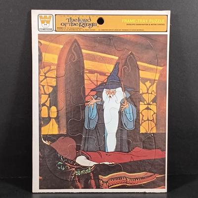 LOT 128: Magic Crystal Ball Kit, 1979 Lord of the Rings Puzzle, Resin Reading Gargoyle & More