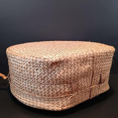 LOT 215: Vintage Straw Travel Case, Cast Iron Wind Chime, Handwoven Rug, Bronze Leaf & More