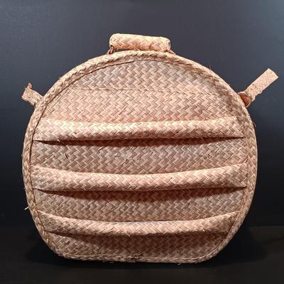 LOT 215: Vintage Straw Travel Case, Cast Iron Wind Chime, Handwoven Rug, Bronze Leaf & More