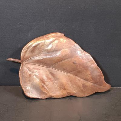 LOT 215: Vintage Straw Travel Case, Cast Iron Wind Chime, Handwoven Rug, Bronze Leaf & More