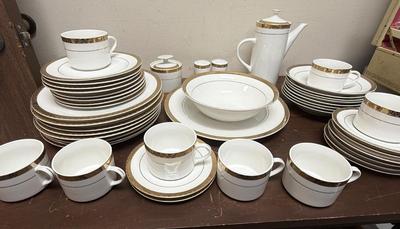 Sale Photo Thumbnail #198: In good condition with 1 piece chipped on underside.
8 dinner plates, 8 luncheon plates, 8 soup bows (1chipped on underside), 8 saucers, 8 cups, 1 coffee pot, 1 serving platter, 1 serving bowl, 1 sugar bowl (no creamer), 1 set of salt & pepper shakers.