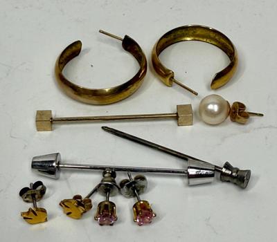 Sale Photo Thumbnail #274: In fair to good used condition. Misc. stud earrings, most not matched, stick pins, and hoop earrings.