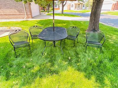 VERY NICE OBLONG IRON PATIO TABLE, CHAIRS AND UMBRELLEA