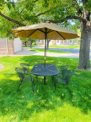 VERY NICE OBLONG IRON PATIO TABLE, CHAIRS AND UMBRELLEA