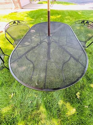 VERY NICE OBLONG IRON PATIO TABLE, CHAIRS AND UMBRELLEA