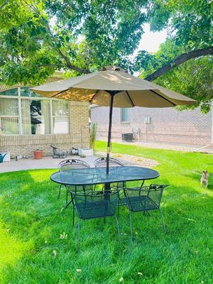VERY NICE OBLONG IRON PATIO TABLE, CHAIRS AND UMBRELLEA