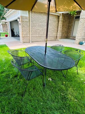 VERY NICE OBLONG IRON PATIO TABLE, CHAIRS AND UMBRELLEA