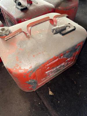 Sale Photo Thumbnail #1472: X8 Metal gas cans