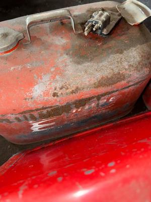 Sale Photo Thumbnail #1473: X8 Metal gas cans
