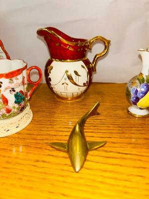 TEA CUPS AND SAUCER’S WITH A BRASS SHARK