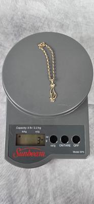 Lot 50: 7" - 10k Gold Bracelet & 10k Gold Cat Pendant with Diamond Eyes - 3g