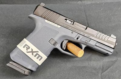 Sale Photo Thumbnail #8: MANUFACTURER: Ruger
FAMILY: RXM Series
MODEL: RXM
TYPE: Semi-Auto Pistol
ITEM GROUP: Centerfire Polymer Pistols
ACTION: Striker Fired
CALIBER/GAUGE: 9mm
FINISH: Black FNC Nitride
FINISH TYPE: Black
FRAME: Polymer Frame
STOCK/GRIPS: Stealth Gray Magpul EHG