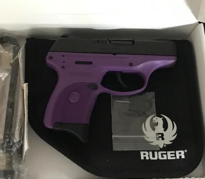 Sale Photo Thumbnail #14: MANUFACTURER: Ruger
FAMILY: LCP Series
MODEL: LCP Lady Lilac
TYPE: Semi-Auto Pistol
ITEM GROUP: Centerfire Polymer Pistols
ACTION: Double Action Only
CALIBER/GAUGE: 380 ACP
FINISH: Blue
FRAME: Polymer Frame
STOCK/GRIPS: Purple Polymer
BARREL: 2.75"
OVERAL