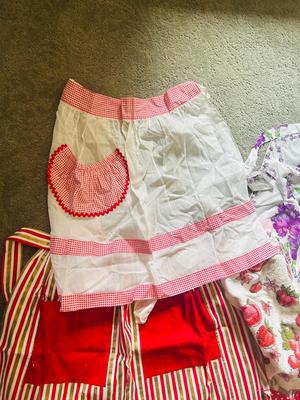 NOT EXACTLY JUNE CLEVERS APRONS BUT CLOSE