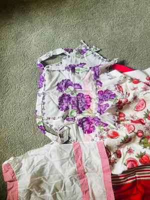 NOT EXACTLY JUNE CLEVERS APRONS BUT CLOSE