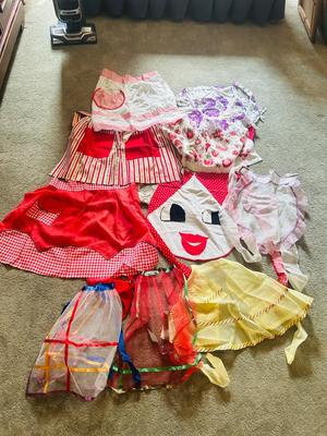 NOT EXACTLY JUNE CLEVERS APRONS BUT CLOSE