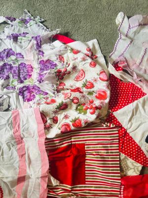 NOT EXACTLY JUNE CLEVERS APRONS BUT CLOSE