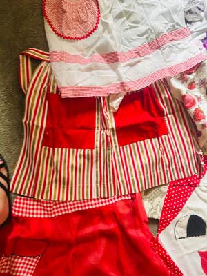 NOT EXACTLY JUNE CLEVERS APRONS BUT CLOSE
