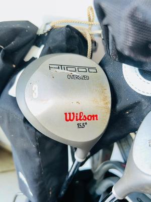 FULL SET OF WILSON GOLF CLUBS IN BAG WITH BALLS & TEES A ND A BONUS CALLAWAY TITAN 10° BIG BERTHA WAR BIRD DRIVER
