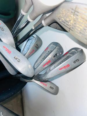 FULL SET OF WILSON GOLF CLUBS IN BAG WITH BALLS & TEES A ND A BONUS CALLAWAY TITAN 10° BIG BERTHA WAR BIRD DRIVER
