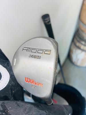 FULL SET OF WILSON GOLF CLUBS IN BAG WITH BALLS & TEES A ND A BONUS CALLAWAY TITAN 10° BIG BERTHA WAR BIRD DRIVER