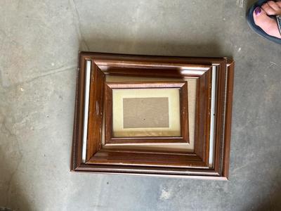 A VARIETY OF DIFFERENT SIZED WOODEN FRAMES