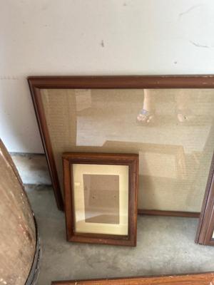 A VARIETY OF DIFFERENT SIZED WOODEN FRAMES