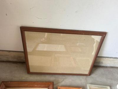 A VARIETY OF DIFFERENT SIZED WOODEN FRAMES
