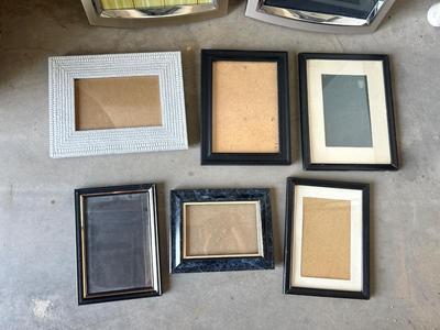 SILVER AND BLACK PICTURE FRAMES