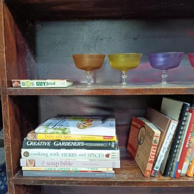 LOT 109: MCM Book Cae with Pink Depression Glassware, Cookbooks & Vintage Plastic Margarita Glasses