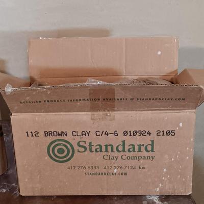 LOT 124: Standard Clay Co. C/4-6 Brown Clay, NIP Wire and Pipes, Marco Wonderglaze Paints, Work Table & More