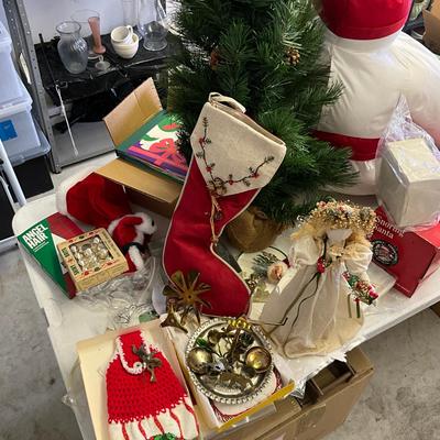 Sale Photo Thumbnail #1039: Mini x-mas light up tree, large snowman, Pinecone x-mas tree, two musical santas, shiny brite, x-mas decor, ornaments, stockings