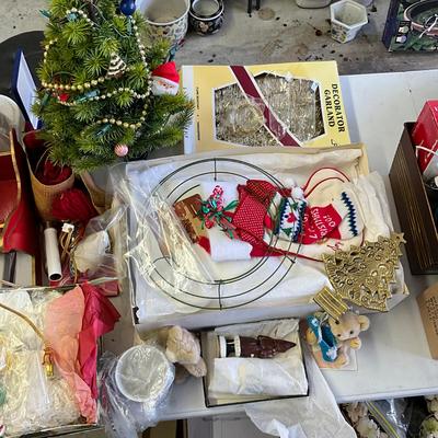 Sale Photo Thumbnail #1036: Mini x-mas light up tree, large snowman, Pinecone x-mas tree, two musical santas, shiny brite, x-mas decor, ornaments, stockings