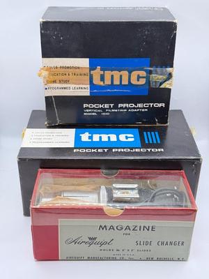 LOT 20L: Vintage TMC Pocket Projectors w/ Boxes & Magazine Airequipt Slide Changer