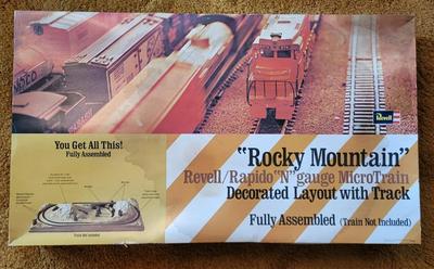LOT 183L: Vintage Revell Fully Assembled N-Gauge MicroTrain 'Rocky Mountain' Decorated Layout Toy in Orignal Box
