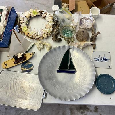 Sale Photo Thumbnail #1159: Pewter trays, stained glass sail boat, small ship model
Large zodiac tray: 16" diameter