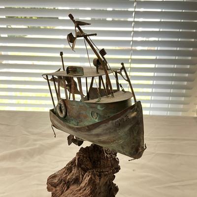 Sale Photo Thumbnail #1242: Signed "Evin '72"
Measures: 9" high x 5" long (boat)