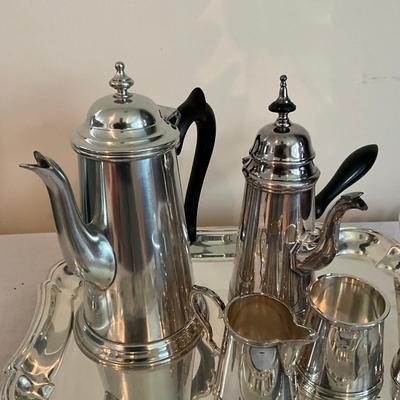 Sale Photo Thumbnail #1261: Comes with snuffer
Tallest pot pitcher: 9" high
Smallest pot pitcher: 8.5" high 
Serving tray: 12" wide x 15" long