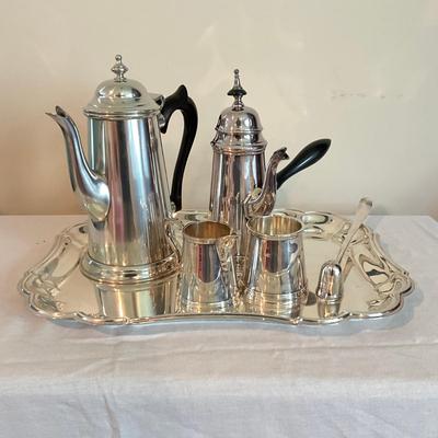 Sale Photo Thumbnail #1260: Comes with snuffer
Tallest pot pitcher: 9" high
Smallest pot pitcher: 8.5" high 
Serving tray: 12" wide x 15" long
