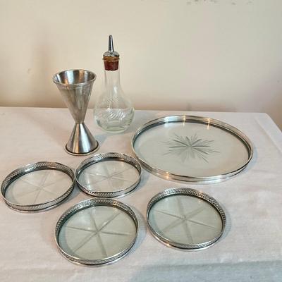 Sale Photo Thumbnail #1299: Sterling glass tray (6.5" diameter), Sterling Silver Measuring For Liquour, Sterling Silver Glass Bidders, 4 Sterling Silver Glass Small Coasters (3.5" diameter