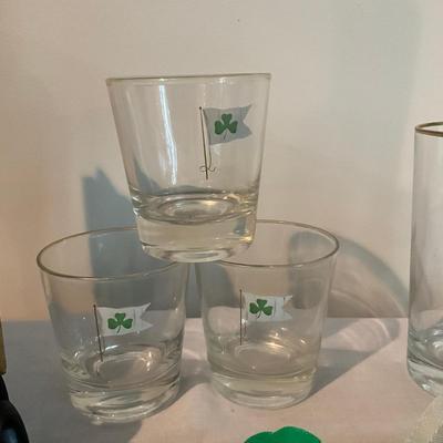 Sale Photo Thumbnail #1367: Three small glasses, three tall glasses, flags, picture frame, one framed boat flag (24" wide x 17" high)