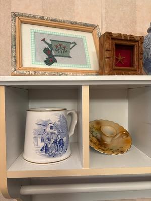 Tall shelf with collectibles