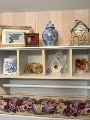 Tall shelf with collectibles