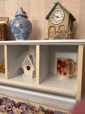 Tall shelf with collectibles